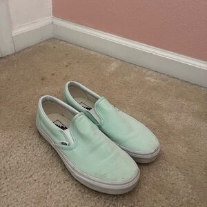 pastel green slip on vans